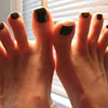 Emily Marilyn's newly painted dark green toes photo gallery